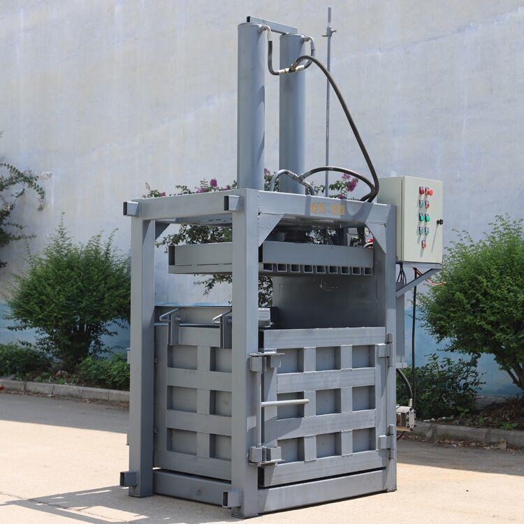 废油漆桶压扁机视频 立式液压打包机价格  80吨海绵液压打包机