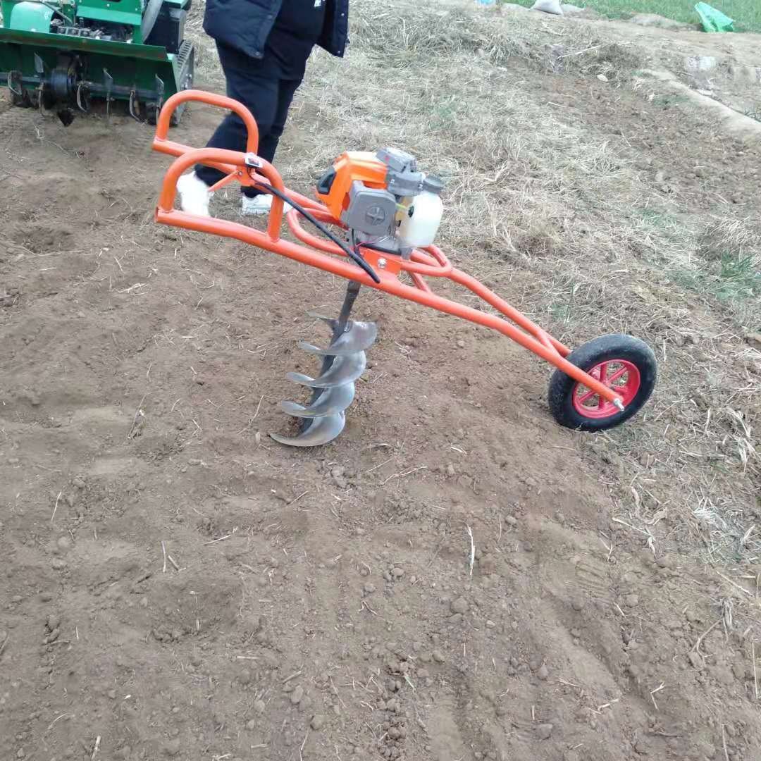 小型带支架轮子行走挖坑机价格   HT003型手提式起树窝子挖坑机  双人手扶带架子9马力农用打洞机