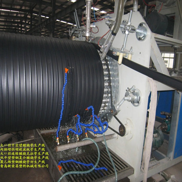 HDPE大口径中空壁缠绕管机器、PE内肋增强螺旋波纹管机组、大口径钢塑缠绕管设备厂家图片