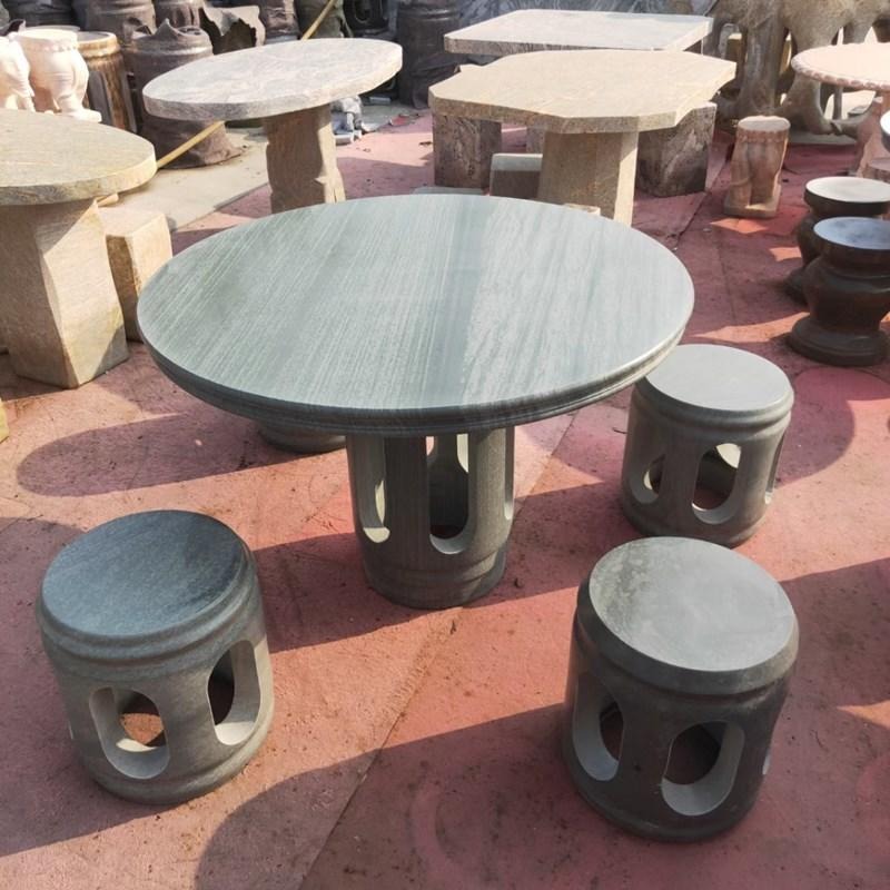 石桌石凳 庭院休息石桌 石雕圆形桌椅 天然石材桌椅 泽业雕塑图片