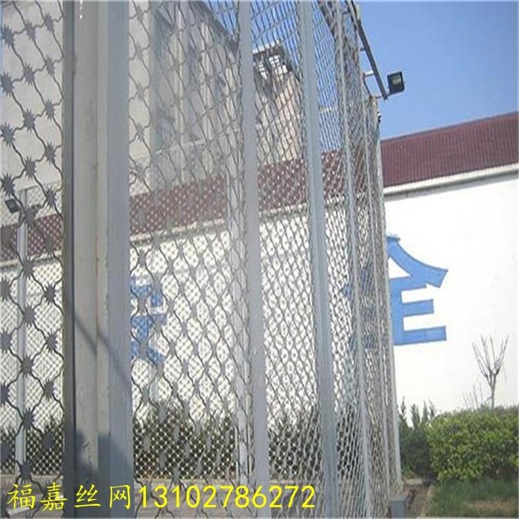 监狱梅花刺片隔离网、监狱隔离网大门、太阳花刺网围墙图片