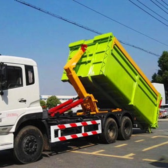 自动顶板上料重汽污泥建筑垃圾钩臂车大型，北京城市环卫垃圾车厂家报价