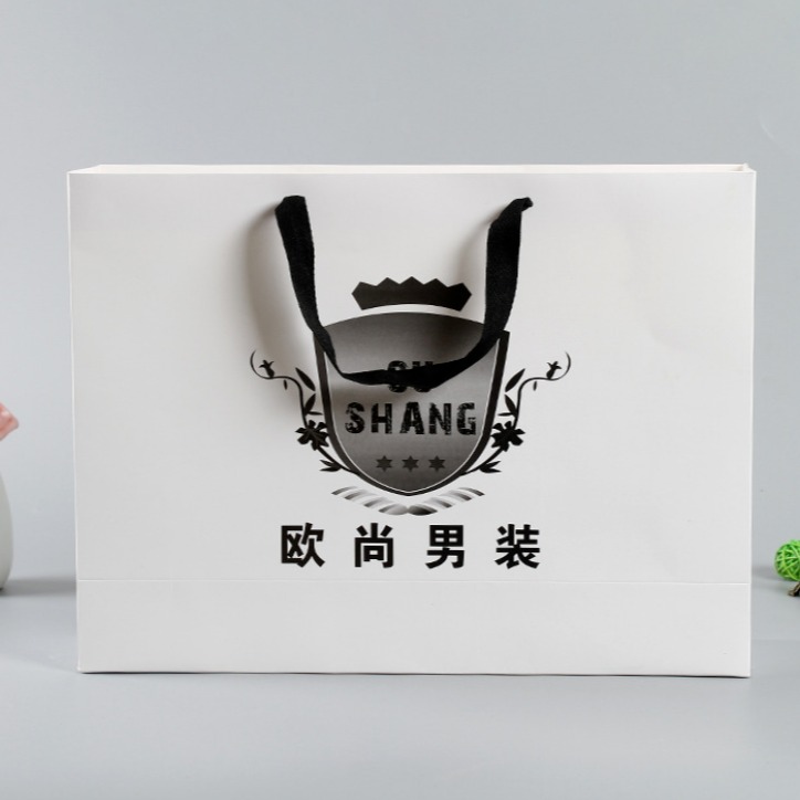 广州服装手提袋 男装服饰袋 白卡纸袋 手提袋定制 广告手提购物袋印刷 定制logo图片