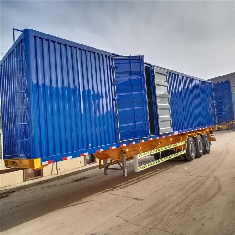 集装箱拖挂车前高后低属于小鹅颈结构能降低载货高度图片